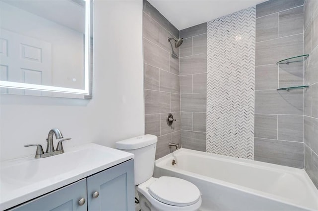 full bath featuring shower / bathtub combination, toilet, and vanity