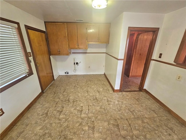 813 2nd Ave, Harvey, LA 70058 - clothes washing area with cabinet space, washer hookup, baseboards, hookup for a gas dryer, and visible vents