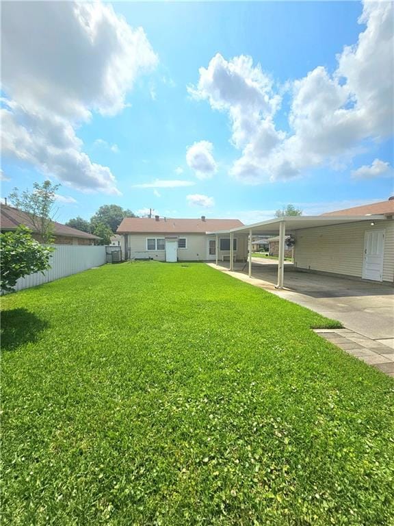 813 2nd Ave, Harvey, LA 70058 - view of yard featuring fence and a carport
