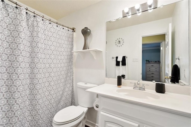 1734 Barrymore St, Slidell, LA 70461 - full bathroom featuring vanity, a textured ceiling, curtained shower, and toilet