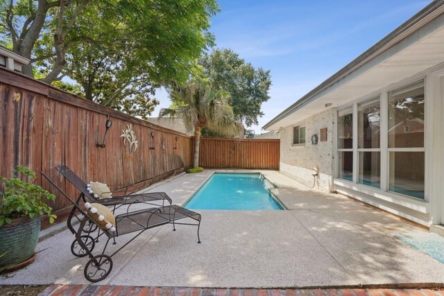 3909 Courtland St, Metairie, LA 70002 - view of pool featuring a fenced in pool, a fenced backyard, and a patio area