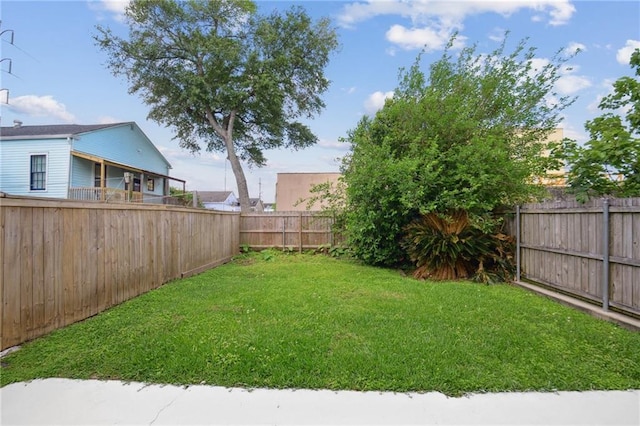 view of yard featuring a fenced backyard
