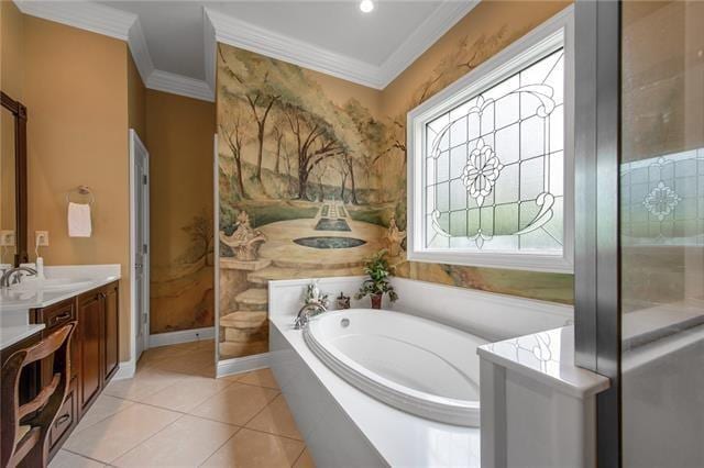 bathroom with crown molding, vanity, baseboards, and a garden tub