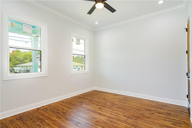 empty room with ceiling fan, crown molding, baseboards, recessed lighting, and dark wood-type flooring