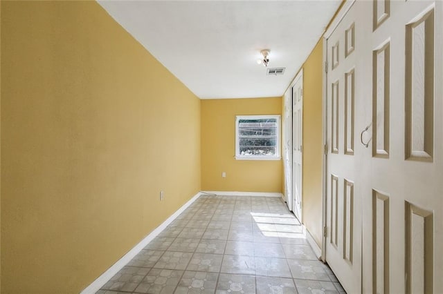452 Maple Loop, La Place, LA 70068 - interior space with light tile patterned floors, baseboards, and visible vents