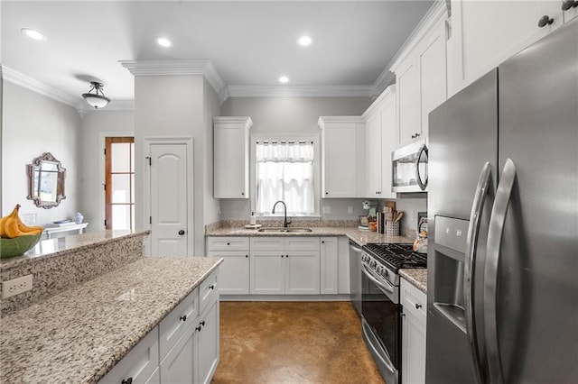 18203 Fox Hollow Loop, Hammond, LA 70401 - kitchen featuring crown molding, a sink, stainless steel appliances, recessed lighting, and white cabinetry