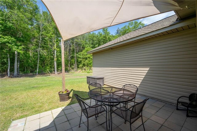 18203 Fox Hollow Loop, Hammond, LA 70401 - view of patio with outdoor dining area
