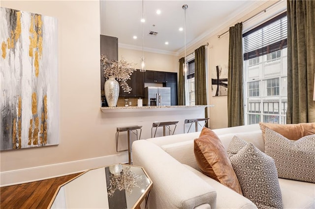 bedroom featuring crown molding, recessed lighting, visible vents, and stainless steel fridge