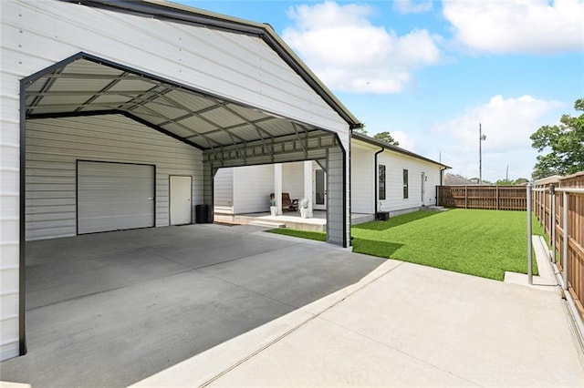 view of car parking featuring a fenced backyard