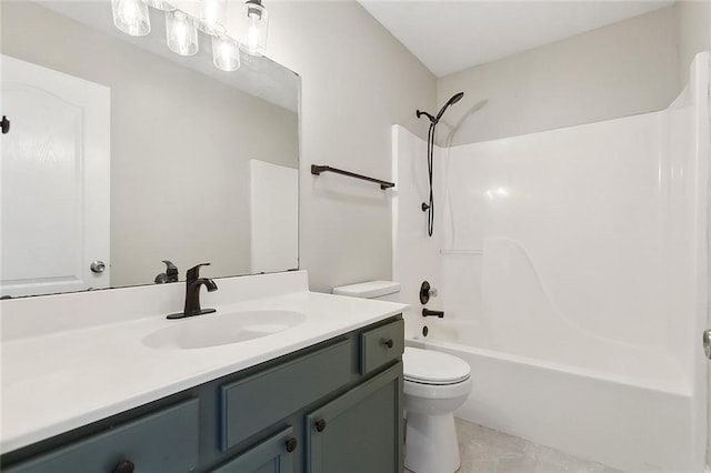 bathroom with toilet, shower / bathing tub combination, and vanity