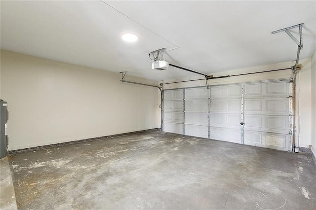 garage featuring a garage door opener and water heater