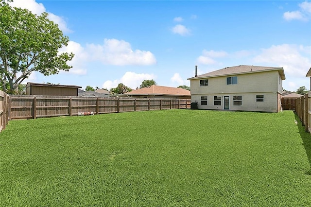 view of yard featuring a fenced backyard