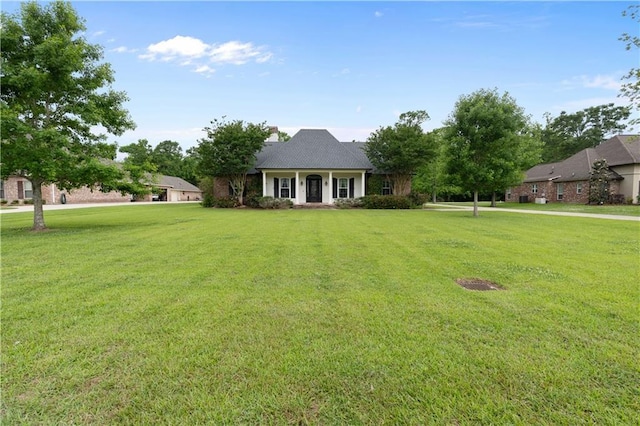 view of front of home with a front yard