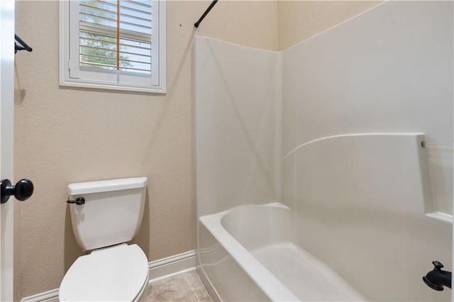 full bath with baseboards and toilet