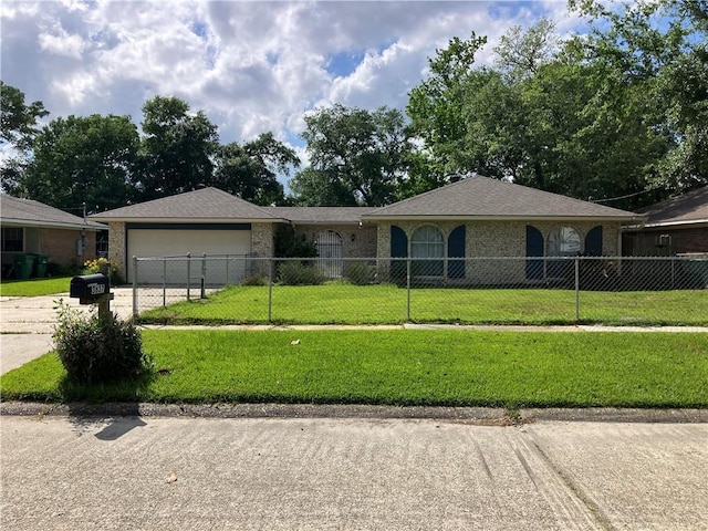 ranch-style house with a garage, a front yard, brick siding, a fenced front yard, and driveway