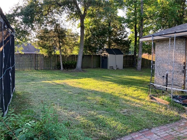 3837 Coventry St, Slidell, LA 70458 - view of yard featuring a shed and an outdoor structure