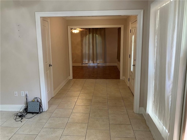 3837 Coventry St, Slidell, LA 70458 - hall featuring light tile patterned floors and baseboards