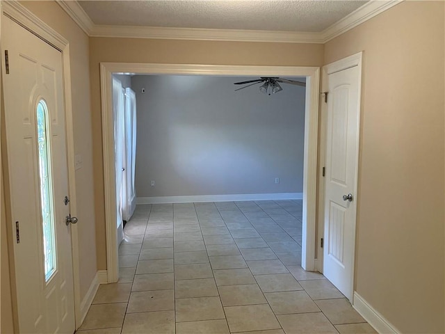 3837 Coventry St, Slidell, LA 70458 - spare room with light tile patterned flooring, ceiling fan, ornamental molding, and a textured ceiling