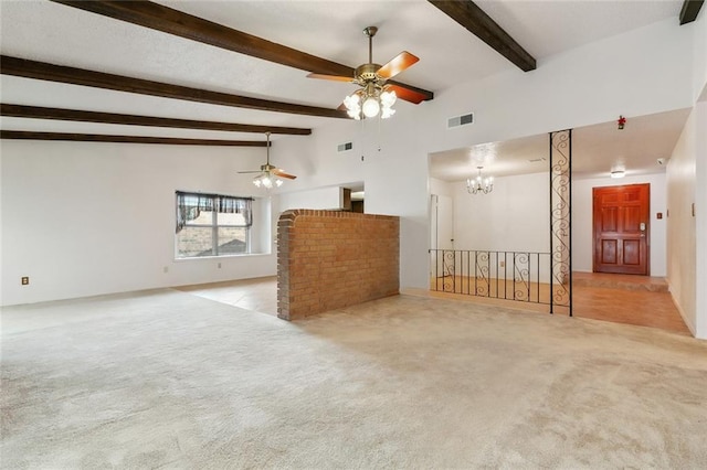 unfurnished living room featuring visible vents, ceiling fan with notable chandelier, carpet floors, and vaulted ceiling with beams