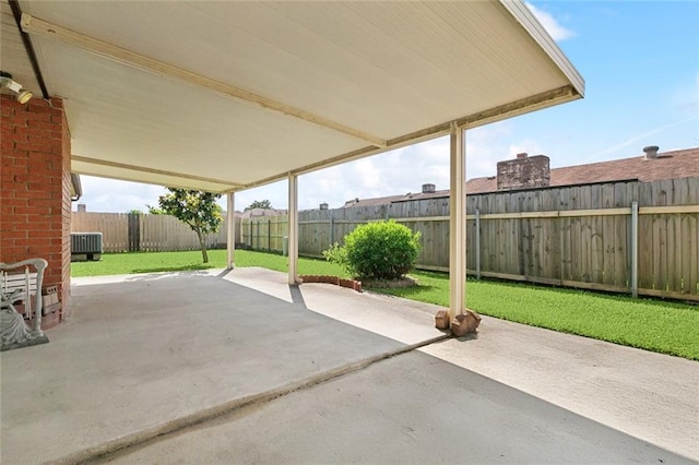 view of patio / terrace with central AC unit and a fenced backyard