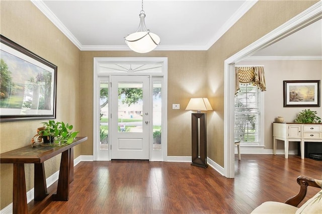 foyer entrance with baseboards, ornamental molding, and wood finished floors