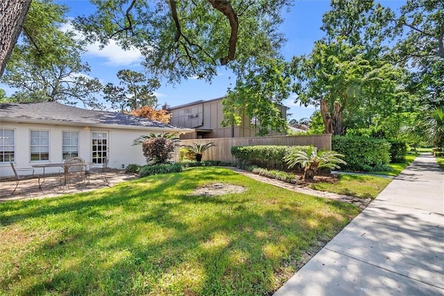 20 Thrasher St, New Orleans, LA 70124 - view of yard featuring fence and a patio area