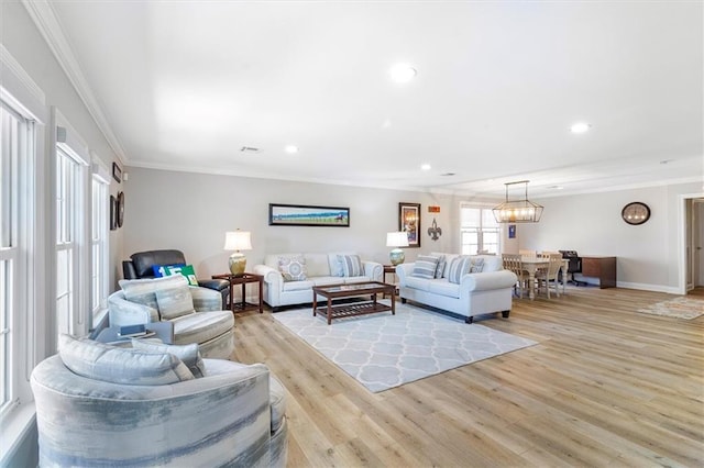 20 Thrasher St, New Orleans, LA 70124 - living area featuring recessed lighting, baseboards, ornamental molding, and light wood-type flooring