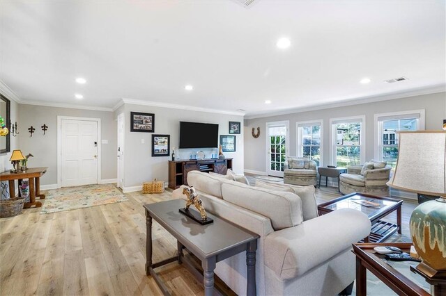 20 Thrasher St, New Orleans, LA 70124 - living area featuring visible vents, recessed lighting, light wood-style floors, and ornamental molding