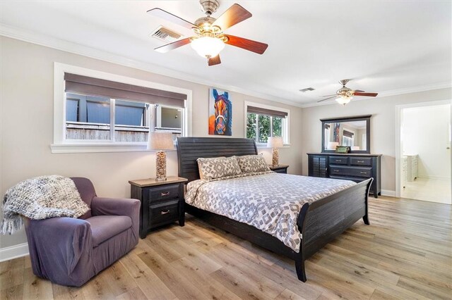 20 Thrasher St, New Orleans, LA 70124 - bedroom with baseboards, visible vents, ornamental molding, and light wood-style flooring