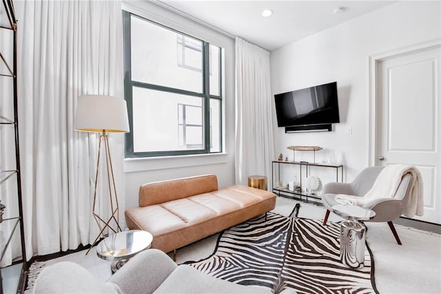 1201 Canal St Unit 416, New Orleans, LA 70112 - carpeted living room featuring recessed lighting