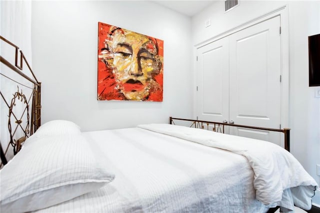 1201 Canal St Unit 416, New Orleans, LA 70112 - bedroom featuring visible vents and a closet