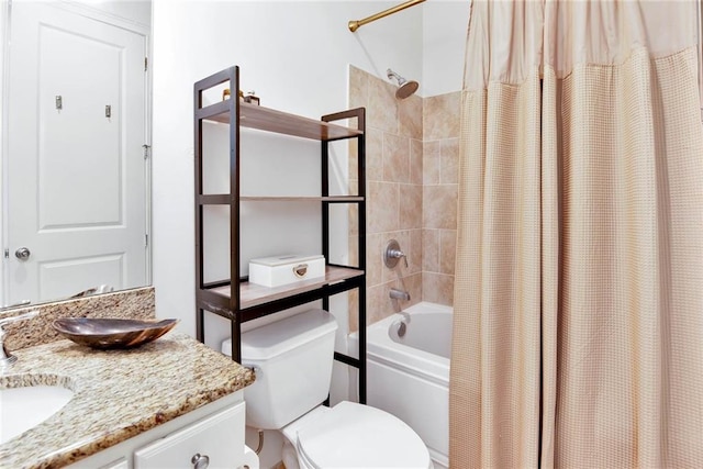 1201 Canal St Unit 416, New Orleans, LA 70112 - bathroom featuring vanity, shower / tub combo with curtain, and toilet