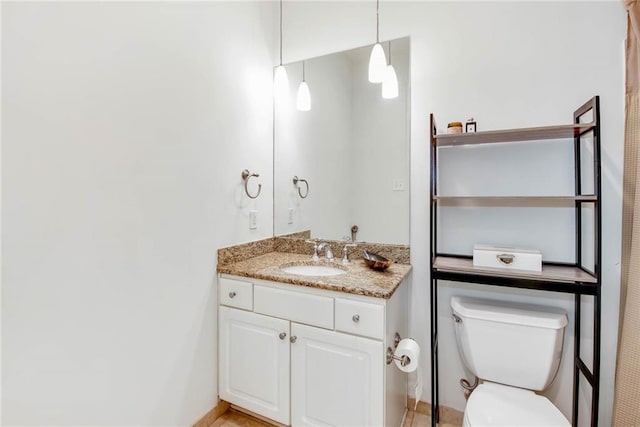 1201 Canal St Unit 416, New Orleans, LA 70112 - bathroom featuring toilet and vanity