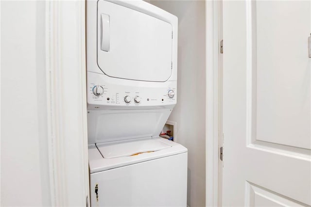 1201 Canal St Unit 416, New Orleans, LA 70112 - laundry area with stacked washer / drying machine and laundry area