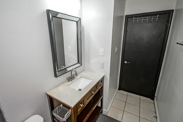 2441 Chartres St, New Orleans, LA 70117 - bathroom featuring vanity and tile patterned flooring