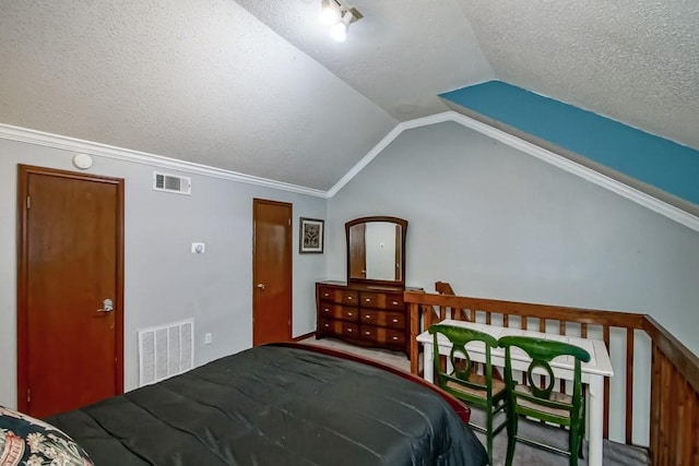2441 Chartres St, New Orleans, LA 70117 - carpeted bedroom with visible vents, a textured ceiling, crown molding, and vaulted ceiling