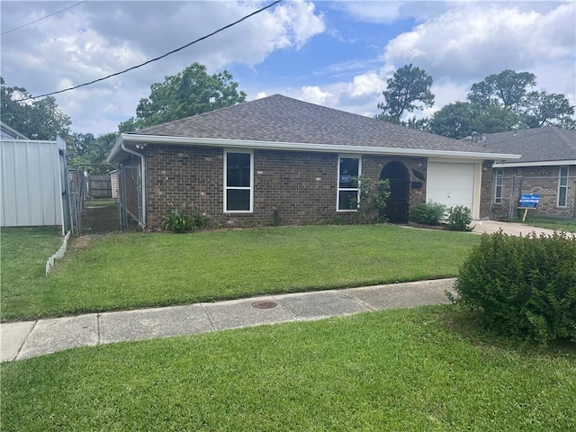 ranch-style house featuring brick siding, an attached garage, roof with shingles, driveway, and a gate