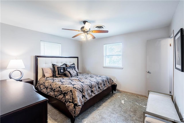 carpeted bedroom featuring baseboards, ceiling fan, and visible vents