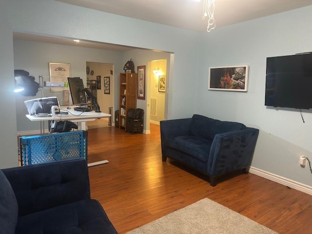 5167 Lafaye St, New Orleans, LA 70122 - living room featuring wood finished floors