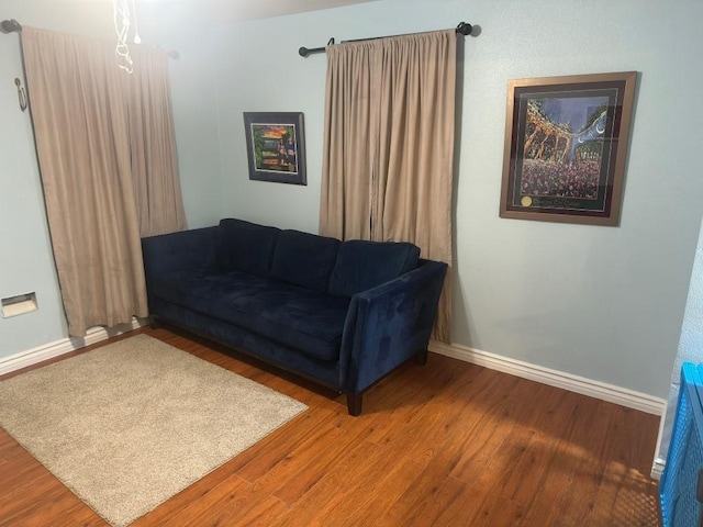 5167 Lafaye St, New Orleans, LA 70122 - living area with wood finished floors and baseboards