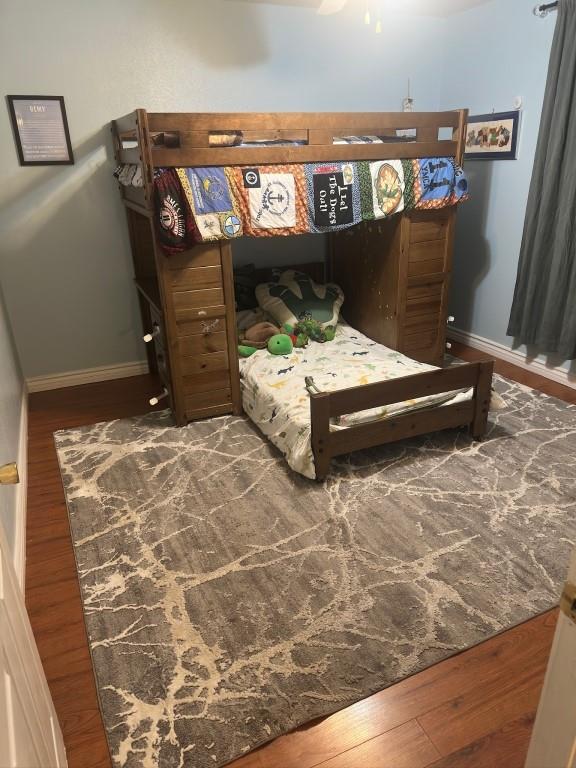 5167 Lafaye St, New Orleans, LA 70122 - bedroom featuring wood finished floors and baseboards