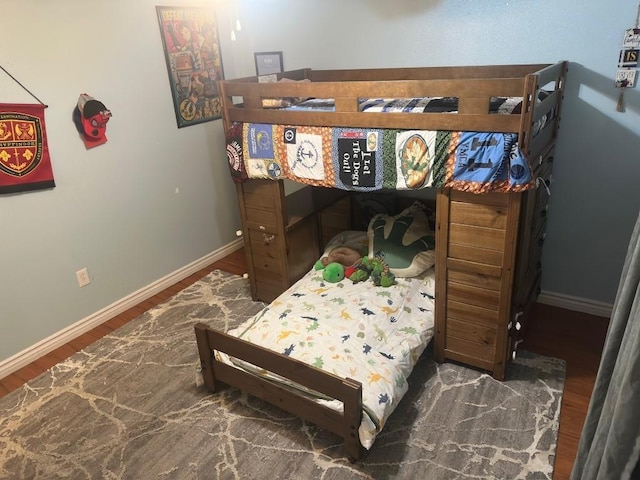 5167 Lafaye St, New Orleans, LA 70122 - bedroom featuring wood finished floors and baseboards