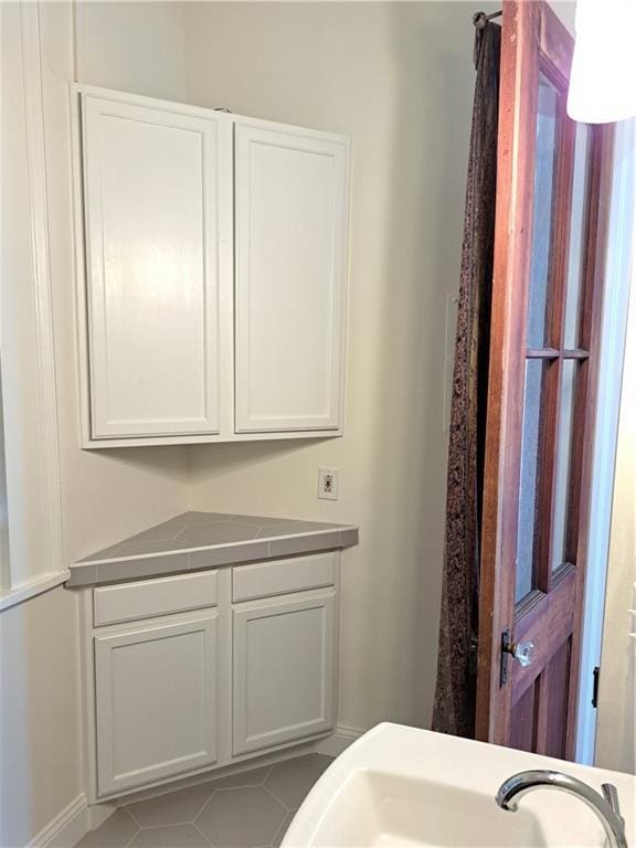 1131 Burgundy St Unit B, New Orleans, LA 70116 - bathroom featuring a sink