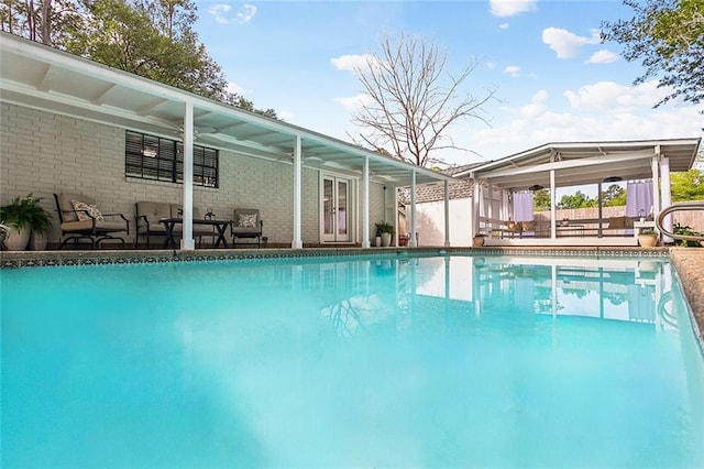 pool with a patio area
