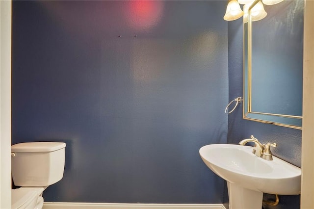 bathroom with a sink and toilet