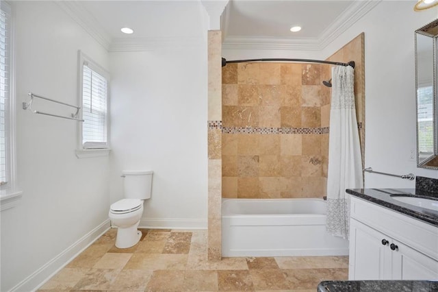 bathroom with crown molding, baseboards, vanity, toilet, and shower / bath combo with shower curtain