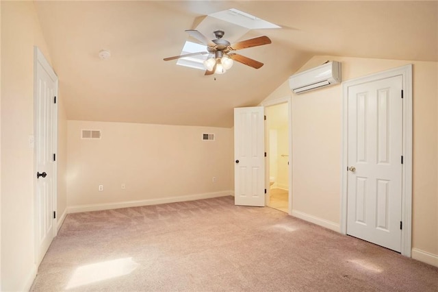 additional living space featuring light colored carpet, a wall mounted AC, and visible vents