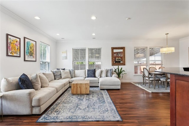 living area featuring recessed lighting, baseboards, ornamental molding, and dark wood-type flooring