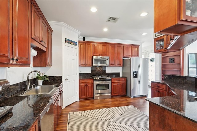 kitchen with visible vents, recessed lighting, dark wood-type flooring, a sink, and appliances with stainless steel finishes
