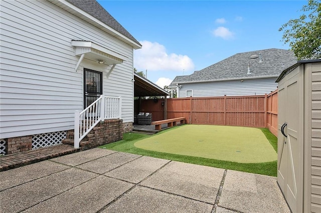 view of yard with a patio and a fenced backyard
